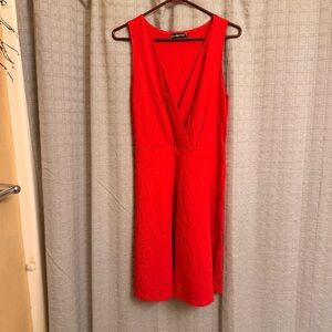 Sarin Mathew’s Vibrant Red V-Neck dress